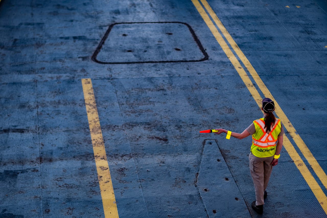 Woman directing aircraft