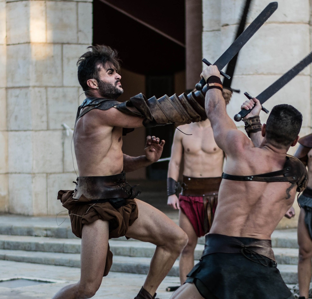 Men fighting with Swords